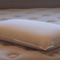 solid-latex-pillow-angle-view-45th-st-bedding